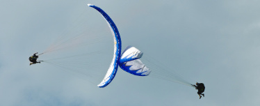 Полет на параплане с инструктором с воздушным пилотажем